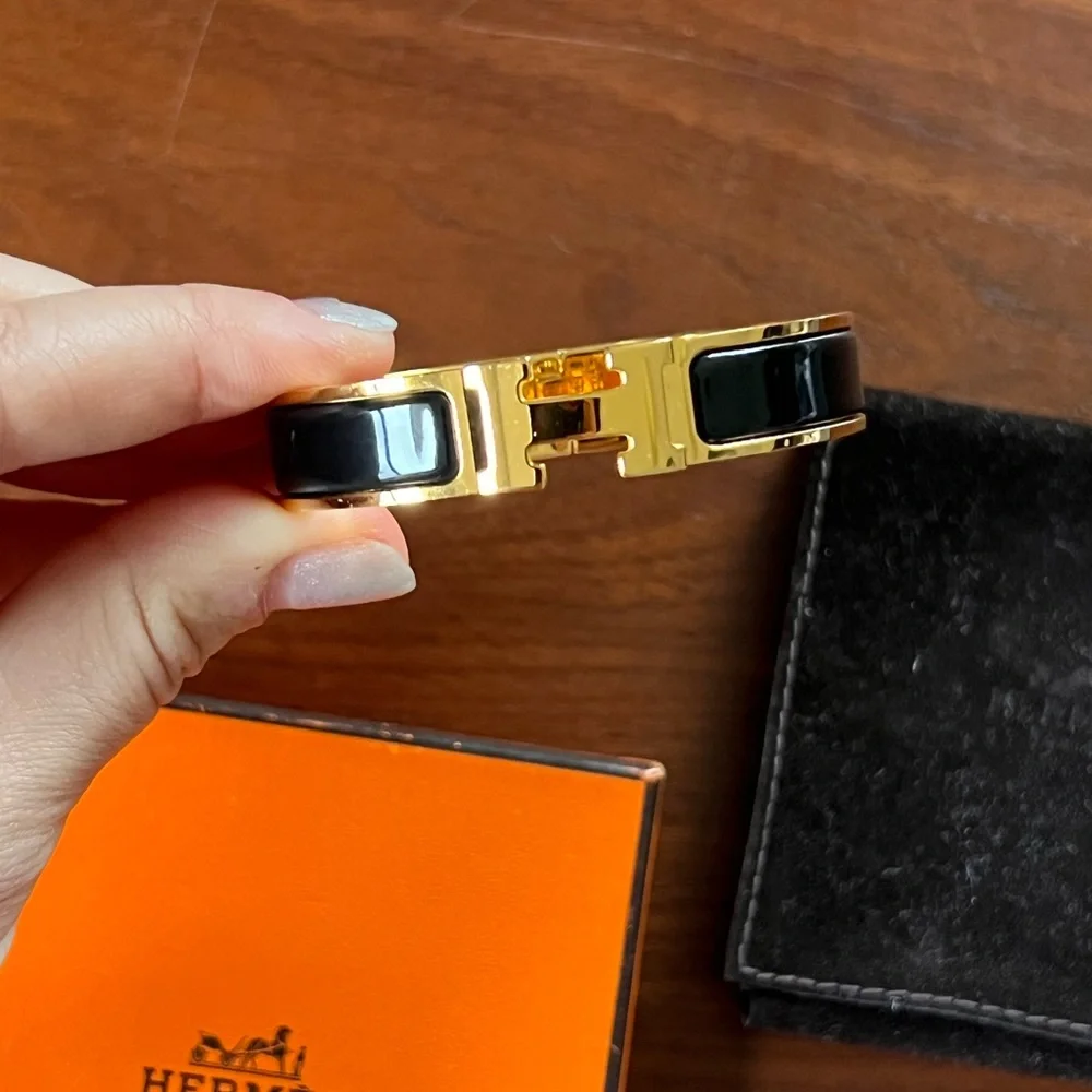 Hermès Clic H Bracelet With Gold and Black Enamel